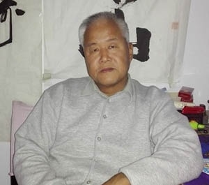 ​张文毅
